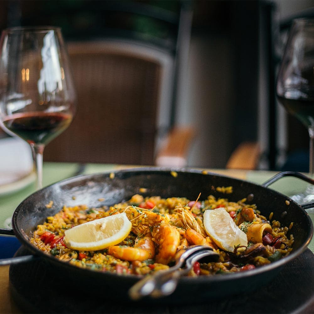 Scrumptious paella and red wine from La Española Olive Oil Instagram